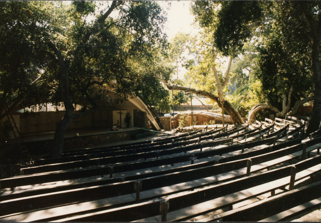 Libbey Park Bowl seating and stage area surrounded by trees, circa 1980s.